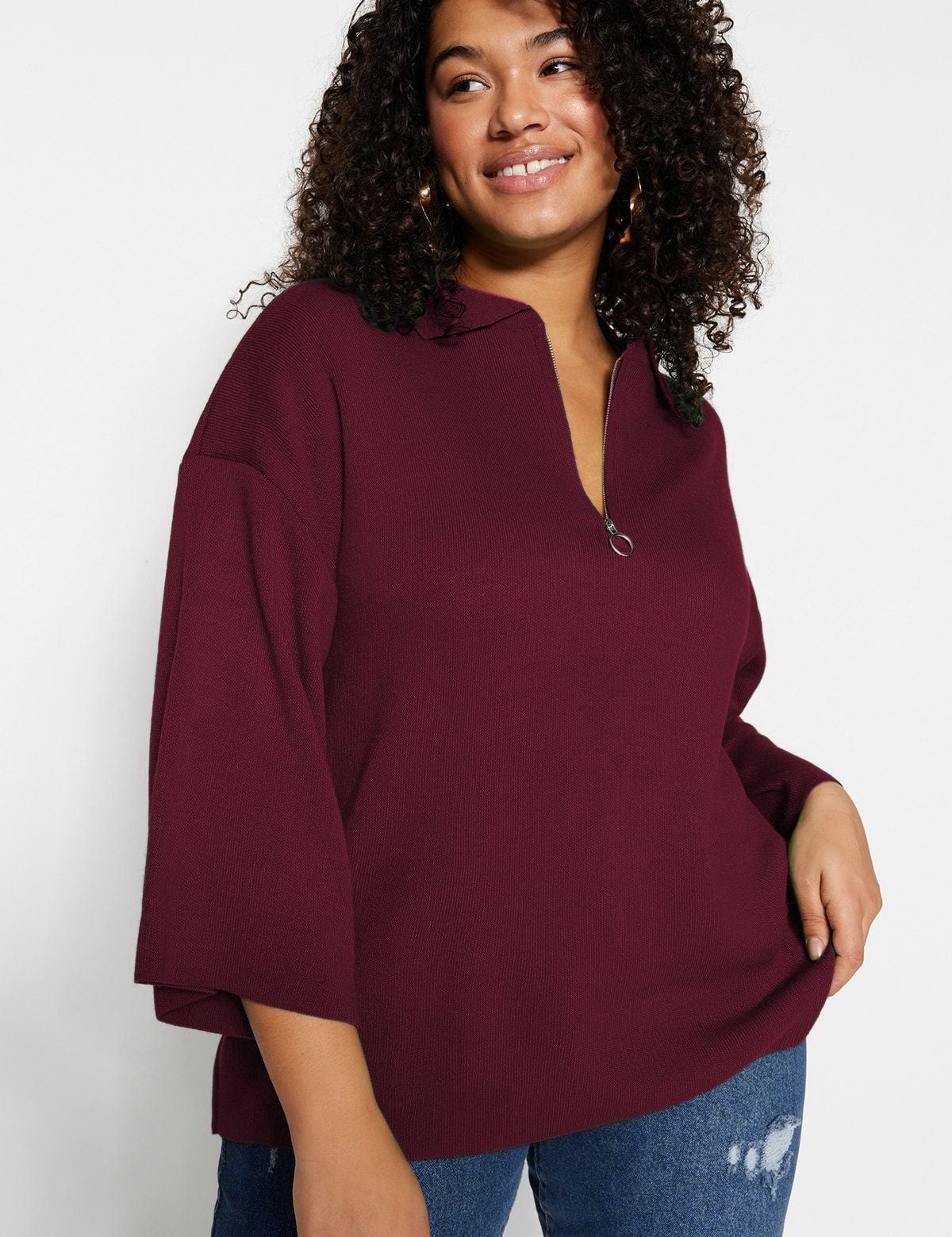 Shop this cozy burgundy half-zip pullover sweater for women. Perfect for casual wear or layering, this relaxed-fit knit top combines comfort and style for every occasion.