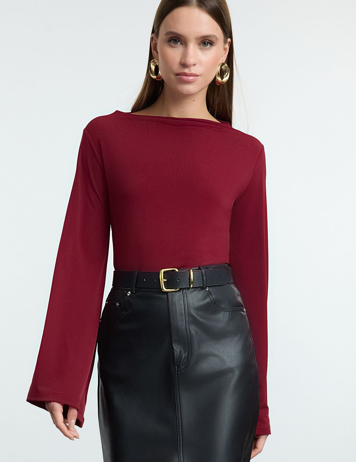 Elevate your style with our women’s long-sleeve burgundy top. Crafted from stretchy fabric for a comfortable fit, perfect for work or evening wear. Shop now!