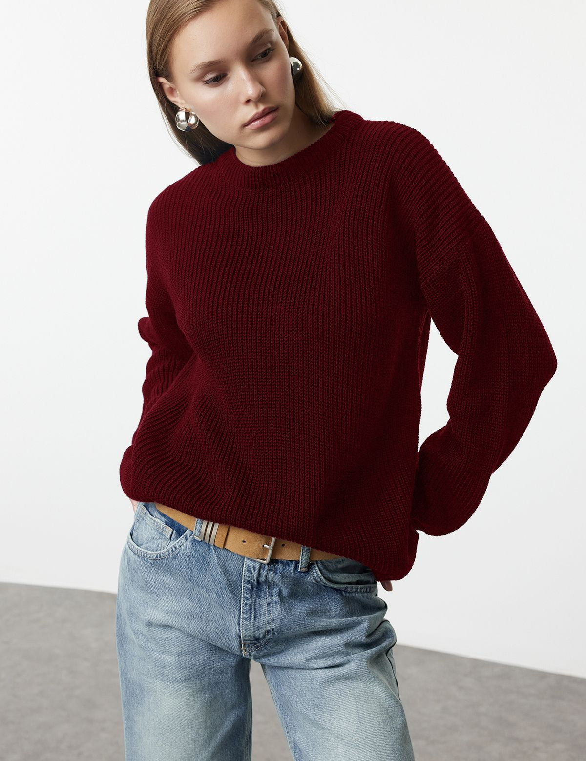 Discover effortless style with this cozy burgundy knit sweater. Oversized for a relaxed fit, this soft crewneck is perfect for layering or standalone looks. Shop AtikaStyle now!