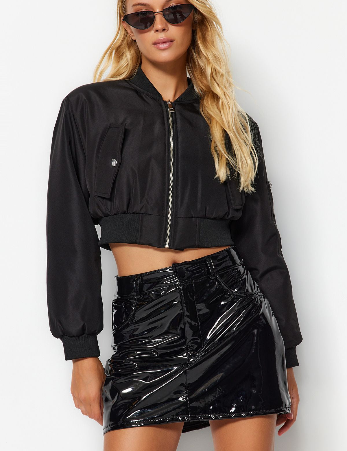 Black Vinyl High-Shine Mini Skirt – Bold and Stylish Night-Out Look

Shop this black vinyl mini skirt for a high-gloss, edgy style. Perfect for nights out and streetwear outfits. Pair it with boots or crop tops for the ultimate statement.