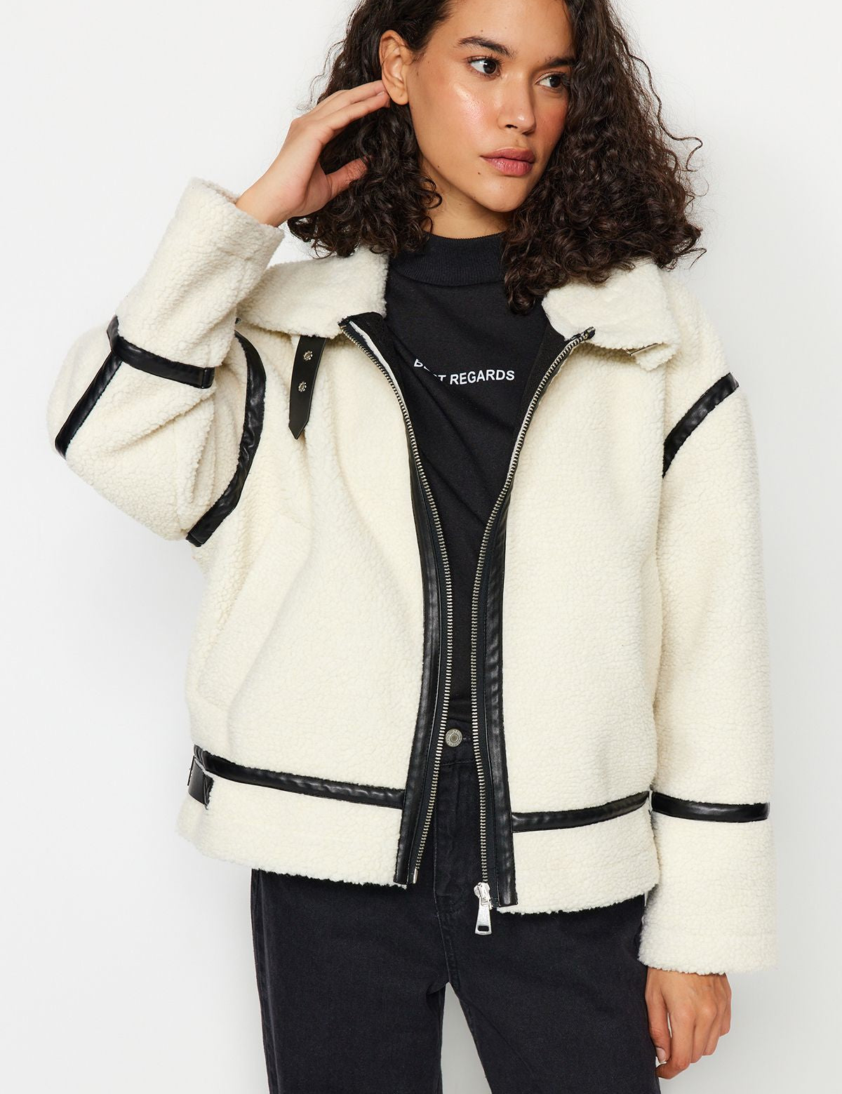 Shop our Women’s Faux Shearling Jacket with sleek faux leather trim. Stay warm and stylish this winter with this cozy, fashionable jacket, perfect for casual or semi-formal looks.