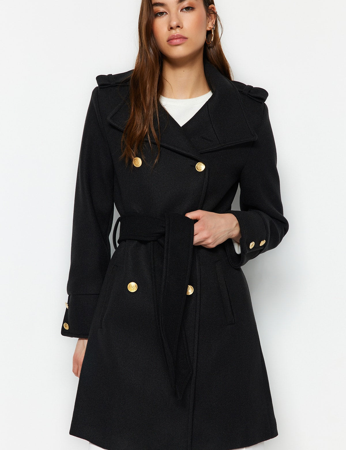 Discover timeless style with our Women’s Double-Breasted Black Trench Coat, featuring a belted waist and gold-tone buttons. This elegant, versatile coat is perfect for any occasion, keeping you warm and sophisticated.