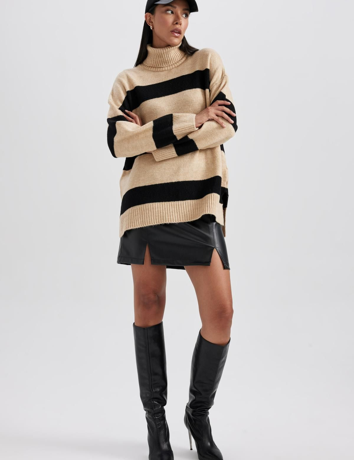 Striped turtleneck sweater
• Beige and black sweater
• Women’s cozy knit pullover
• Fall fashion sweater
• Casual striped knitwear
• Oversized turtleneck sweater
• Trendy winter sweater
• Ribbed cuffs knit sweater
• Soft warm pullover
• Casual chic turtleneck