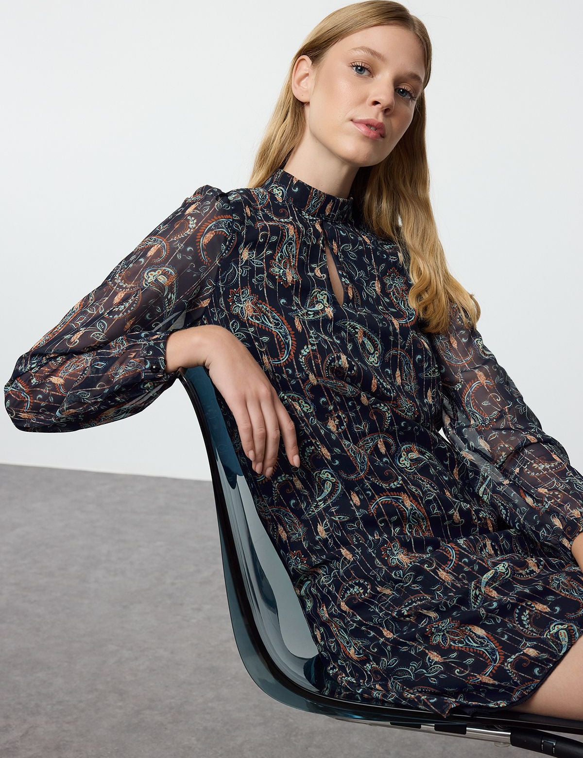 Elevate your boho style with our Boho Paisley Print Long Sleeve Dress. Featuring a chic paisley pattern, sheer sleeves, and a relaxed fit, this versatile mini dress is perfect for casual outings and weekend getaways. Shop now for effortless elegance free shipping!