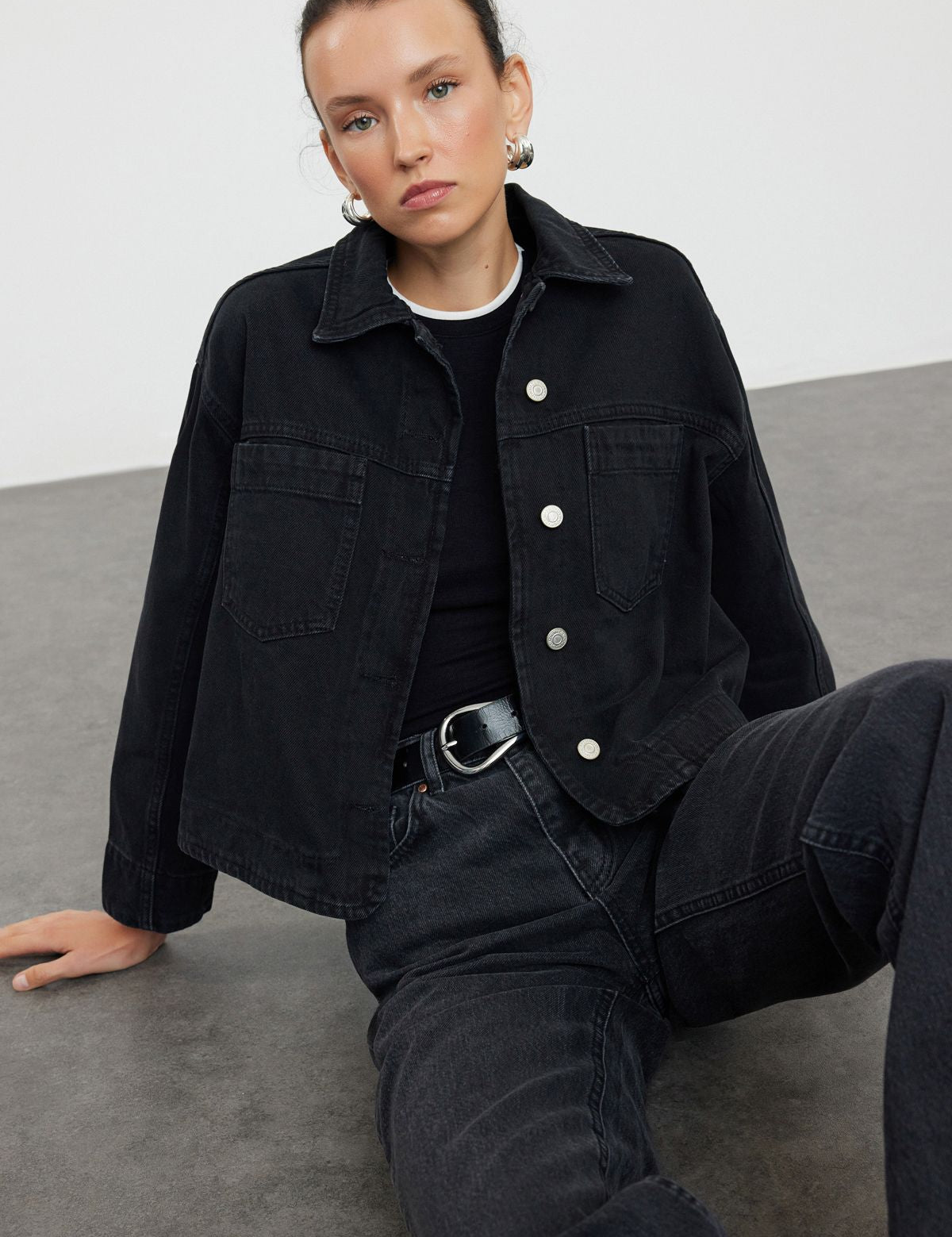 Upgrade your wardrobe with our women’s black denim jacket. Featuring a boxy fit and button-up design, this casual outerwear is perfect for effortless style. Shop now!