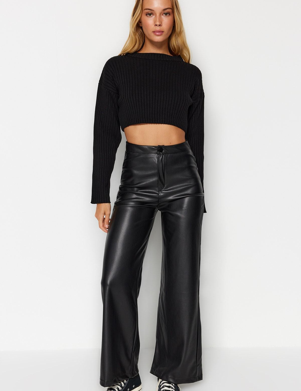 High-Waisted Black Faux Leather Wide-Leg Pants – Trendy & Versatile Women’s Pants

Upgrade your style with these high-waisted black faux leather wide-leg pants. Perfect for casual or chic looks, these vegan leather pants offer a flattering silhouette and versatile styling.