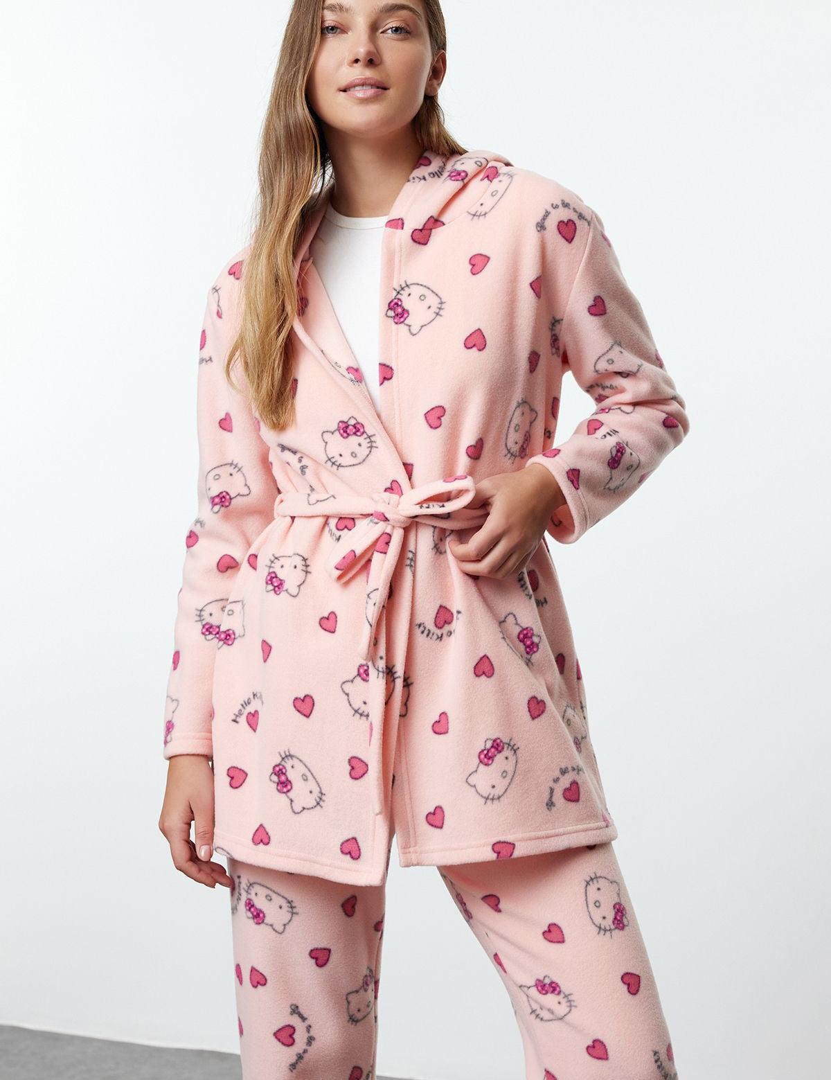 
	•	Women’s cozy pink pajama set
	•	Hooded Hello Kitty lounge wear
	•	Cute fleece robe with matching  
             pajamas
	•	Heart-print Hello Kitty robe and 
             pants
	•	Soft fleece sleepwear for 
             women
	•	Women’s Hello Kitty gift set
	•	Comfortable loungewear for winter nights
	•	Adorable hooded robe and pajama set
	•	Women’s fleece pajama gift idea