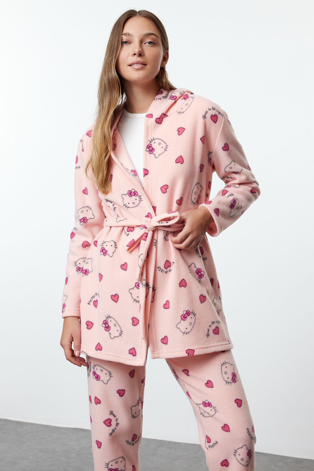 
	•	Women’s cozy pink pajama set
	•	Hooded Hello Kitty lounge wear
	•	Cute fleece robe with matching  
             pajamas
	•	Heart-print Hello Kitty robe and 
             pants
	•	Soft fleece sleepwear for 
             women
	•	Women’s Hello Kitty gift set
	•	Comfortable loungewear for winter nights
	•	Adorable hooded robe and pajama set
	•	Women’s fleece pajama gift idea