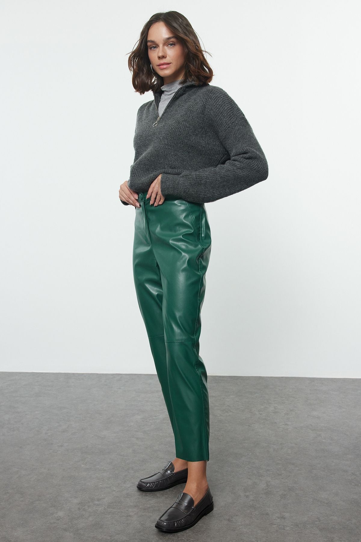 Green faux leather pants, cropped leather pants, vegan leather pants, stylish leather trousers, leather pants women’s fashion, Atika Style leather apparel.