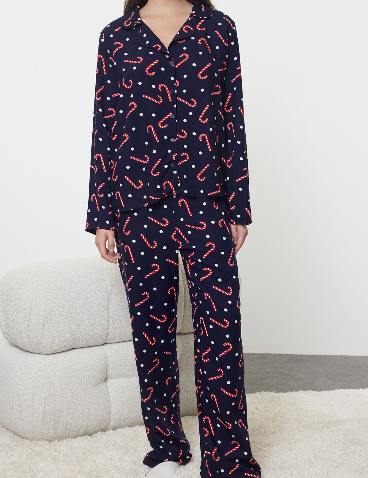 Women’s candy cane print pajama set
	•	Holiday-themed sleepwear for women
	•	Festive navy pajamas with polka dots
	•	Christmas lounge set for women
	•	Cozy two-piece pajama outfit
	•	Holiday pajama gift idea for women
	•	Women’s long-sleeve holiday pajamas
	•	Lightweight Christmas sleepwear
	•	Comfortable festive pajamas for winter
	•	Candy cane and polka dot print pajamas