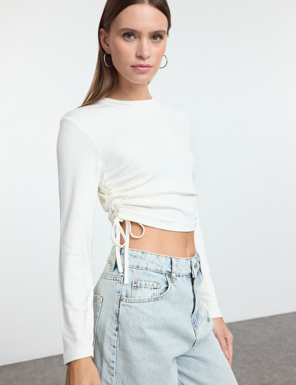 Ruched crop top, white adjustable crop top, side-tie long-sleeve top, women’s casual tops, trendy white crop tops