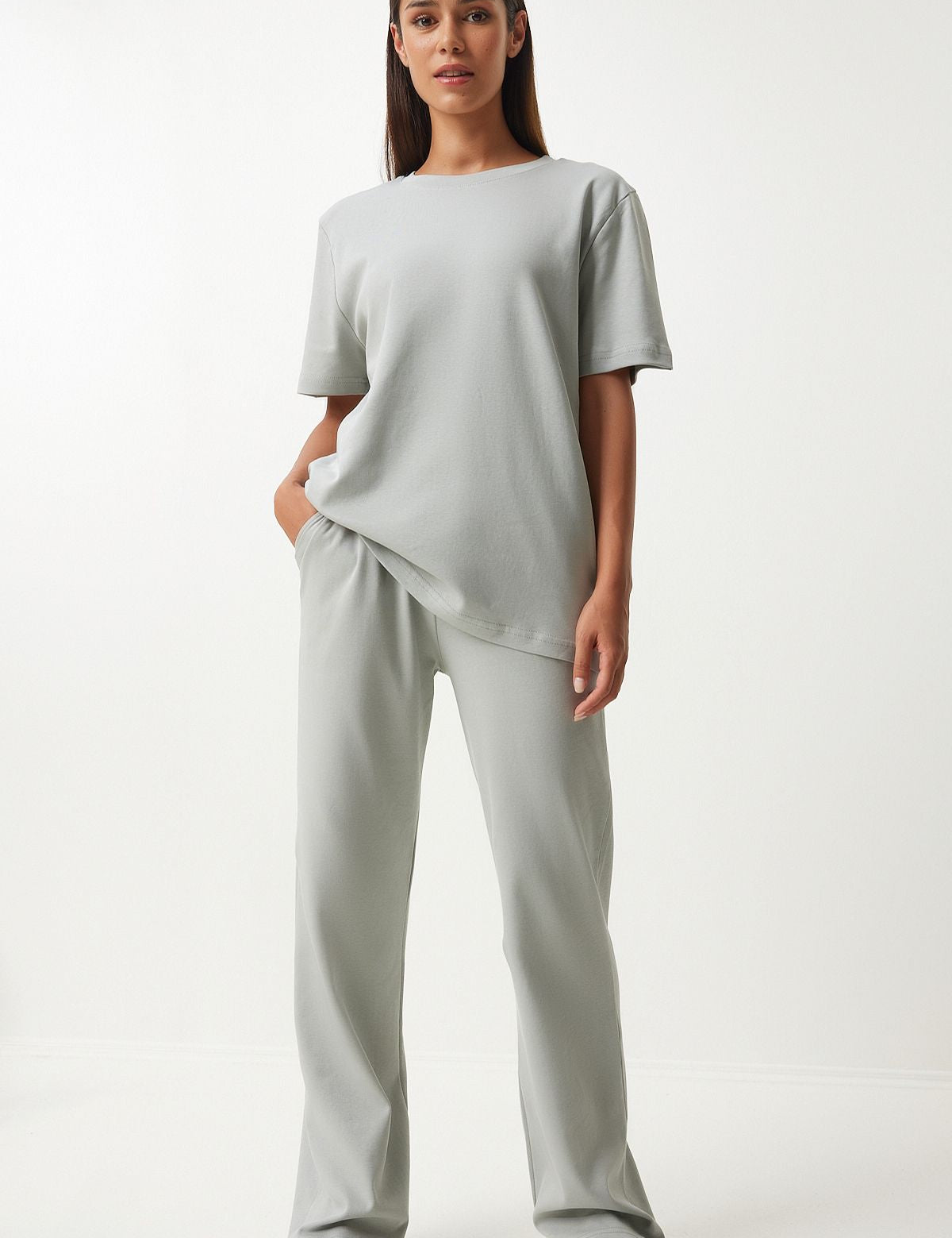  Experience the ultimate in comfort and style with our Minimalist Gray Loungewear Set. Featuring a relaxed-fit T-shirt and wide-leg pants, this sleek and versatile set is perfect for lounging or casual outings. Shop now for stylish and comfortable loungewear!
