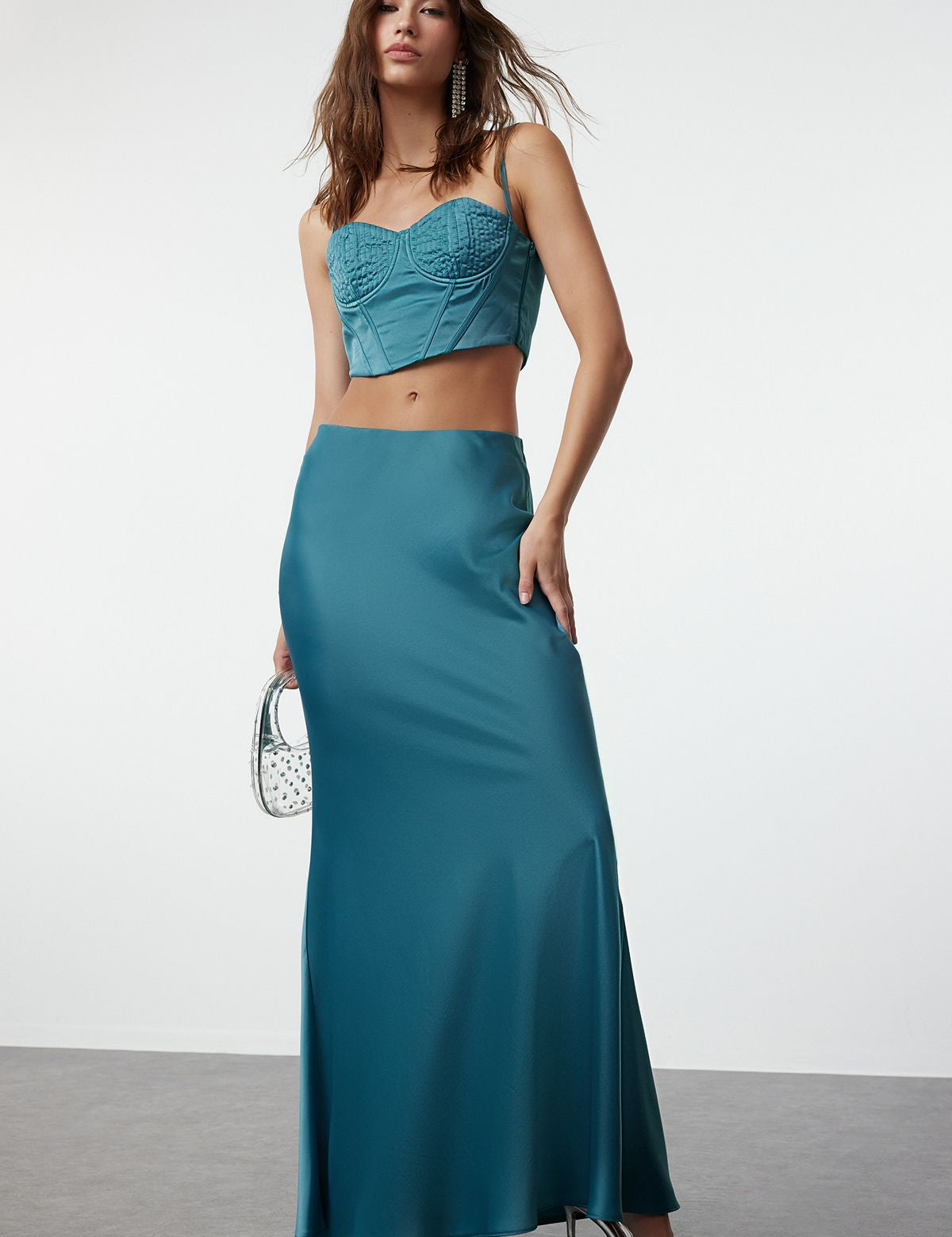 
Discover effortless elegance with our teal bustier and maxi skirt set. Perfect for any occasion, this stylish two-piece features a fitted bustier top and a sleek maxi skirt, offering a sophisticated and modern look. Shop now for chic women’s fashion.