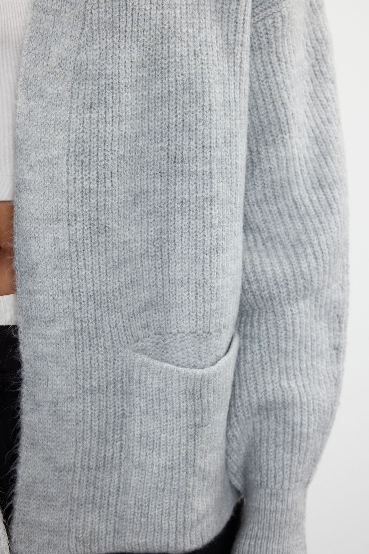 
Women’s open-front cardigan
Cozy knit cardigan
Ribbed texture cardigan
Soft wool blend cardigan
 Stylish women’s cardigan
Casual layering piece
Warm winter cardigan
Versatile knitwear