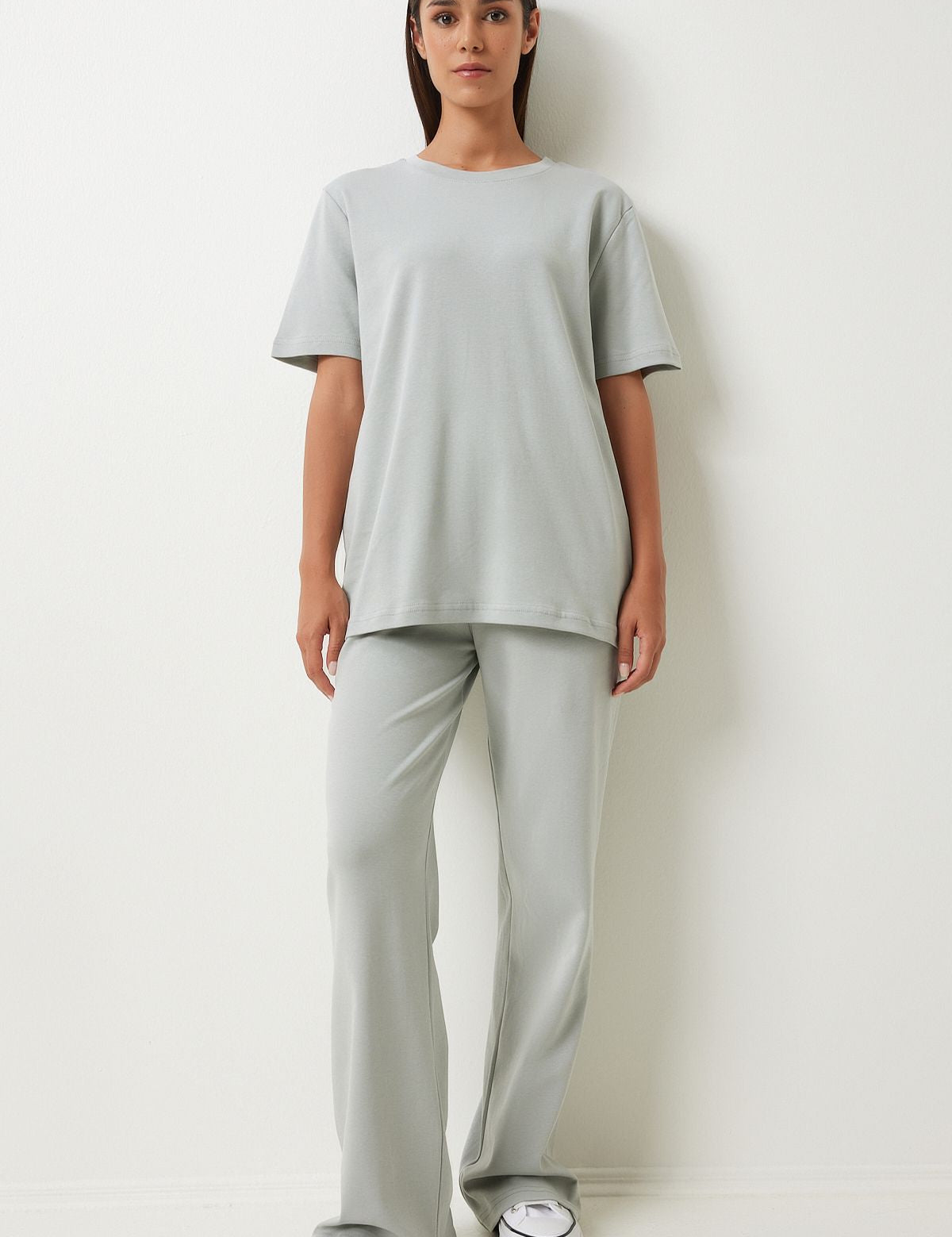  
Experience the ultimate in comfort and style with our Minimalist Gray Loungewear Set. Featuring a relaxed-fit T-shirt and wide-leg pants, this sleek and versatile set is perfect for lounging or casual outings. Shop now for stylish and comfortable loungewear!