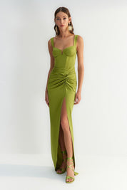 Shop our lime green evening gown featuring a structured bodice with a sweetheart neckline, rushed waist, and thigh-high slit. Perfect for formal events and special occasions, this vibrant dress offers a figure-hugging silhouette and high-quality fabric.