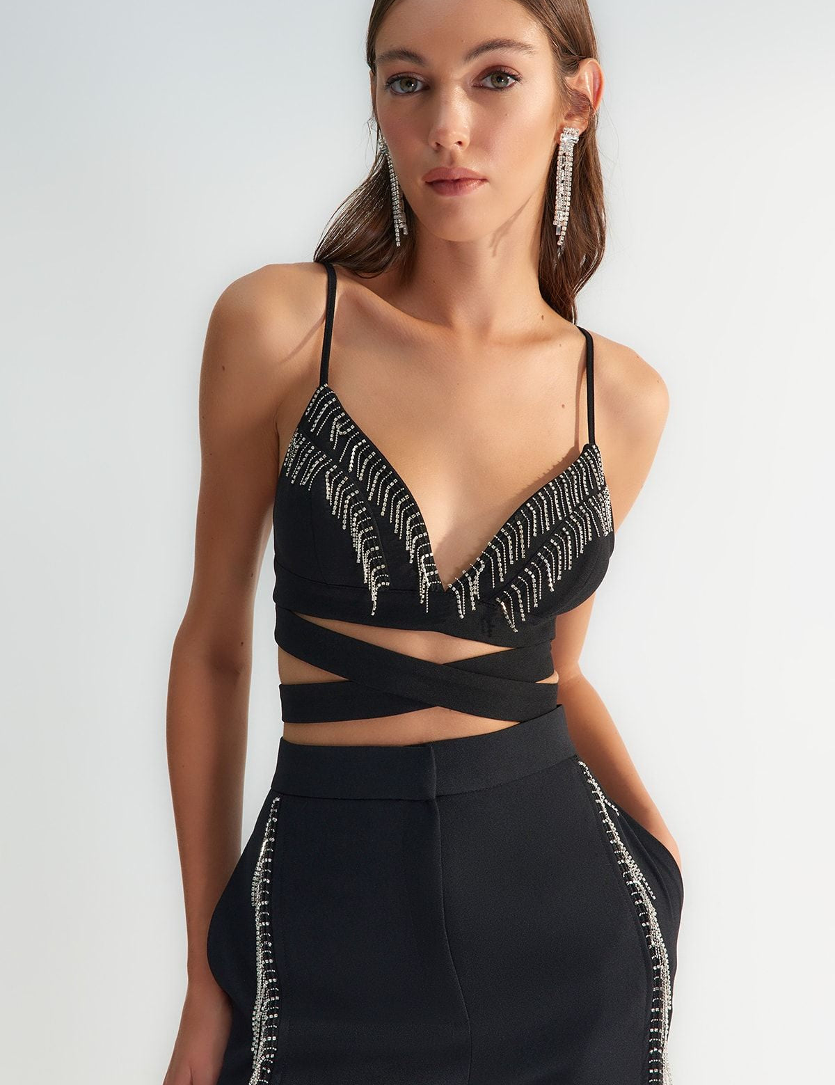 
Discover our dazzling Black Strappy Embellished Crop Top, featuring intricate rhinestone detailing and a chic crisscross design. Perfect for parties and evening events. Shop this stylish and elegant crop top at atikastyle

	•	Black strappy crop top
	•	Embellished crop top
	•	Rhinestone detailed top
	•	Crisscross design crop top
	•	Party crop top
	•	Evening wear crop top
	•	Women’s stylish tops
	•	Chic black crop top
	•	Trendy party outfit
	•	Fashionable evening wear
