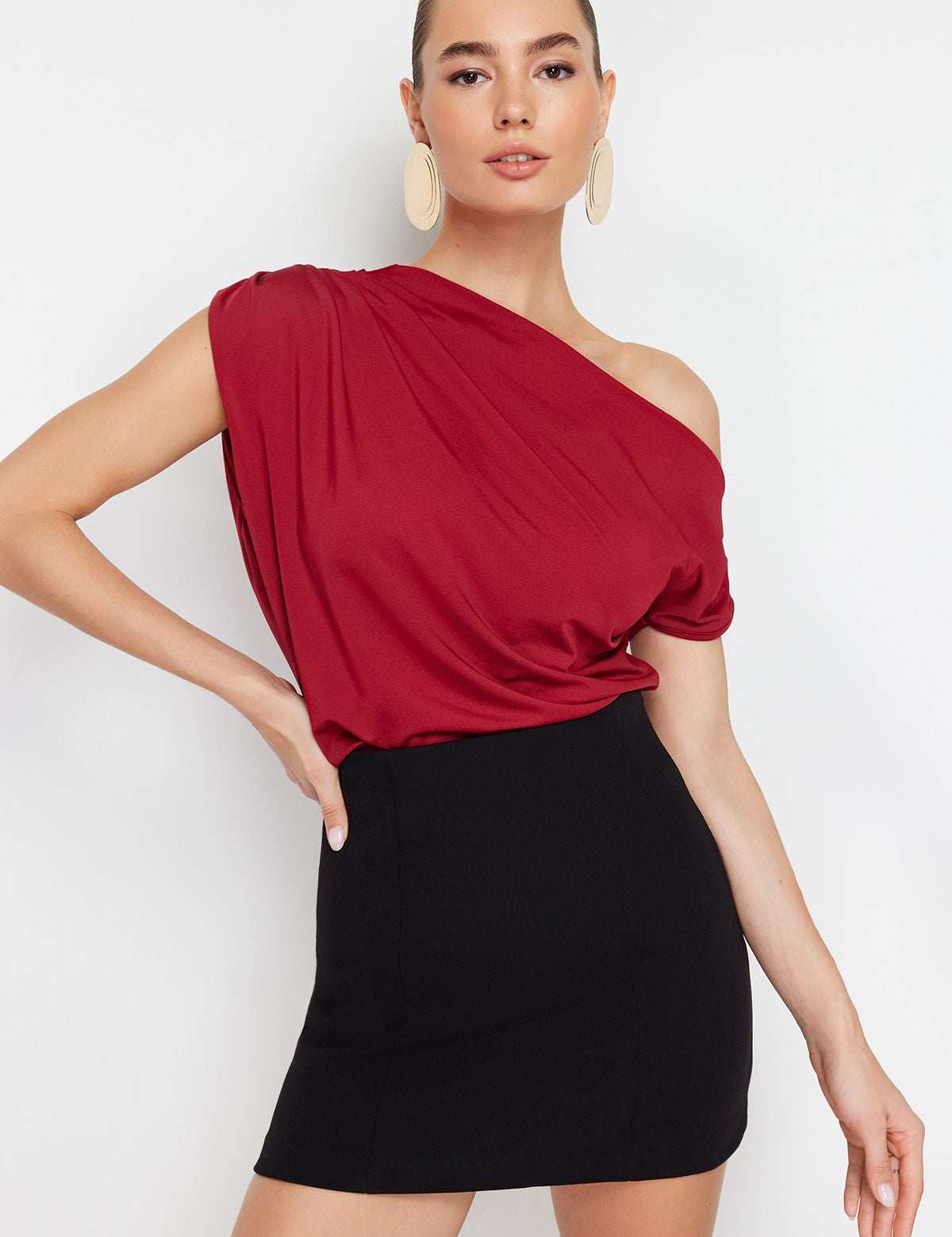 Discover our Elegant Off-Shoulder Red Top, featuring an asymmetrical neckline and rich red hue. Perfect for any occasion, this chic top offers style and comfort. Shop now for a bold fashion statement!