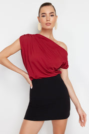 Discover our Elegant Off-Shoulder Red Top, featuring an asymmetrical neckline and rich red hue. Perfect for any occasion, this chic top offers style and comfort. Shop now for a bold fashion statement!